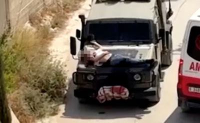 İsrailli askerler bunu da yaptı, yaralı Filistinliyi askeri aracın kaputuna bağladılar